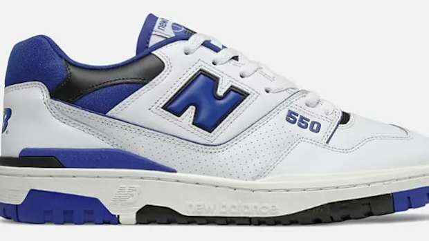 White, blue, and black New Balance shoes.